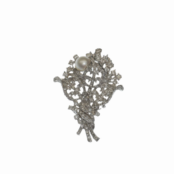 vintage white gold fourteen karat pin with marquise diamond approximately zero point zero seven carats and approximately one hundred and six diamonds size ranging from zero point fifteen carats to zero point zero seven carats each