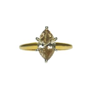yellow gold fourteen karat solitaire engagement style setting with fracture filled marquise cut diamond approximately two point zero zero carats