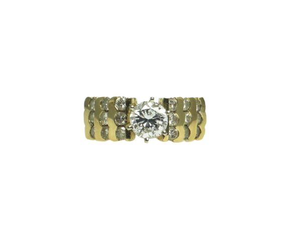 ladies yellow gold fourteen karat engagement ring with center set round brilliant cut diamond one point twelve carats and eighteen round brilliant cut diamonds approximately zero point zero five carats