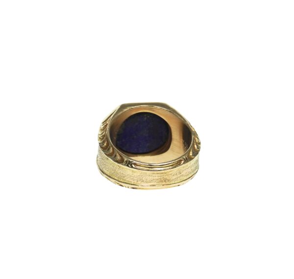 yellow gold fourteen karat gold ring carved style mounting bezel set lapis lazuli with hand carved lamp design